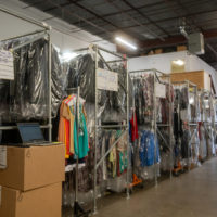 clothes hanging on racks